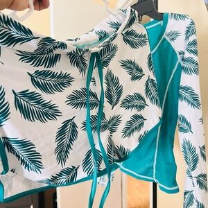 Swimsuit/ shorts and long sleeve shirts